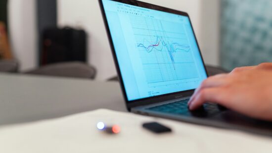 Laptop displaying graphs of boxing data