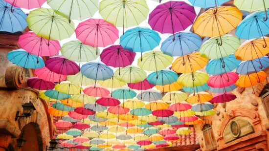 Umbrella flowers are in full bloom in the blue sky, created on the main street of Aesop Village in Everland Resort in South Korea.