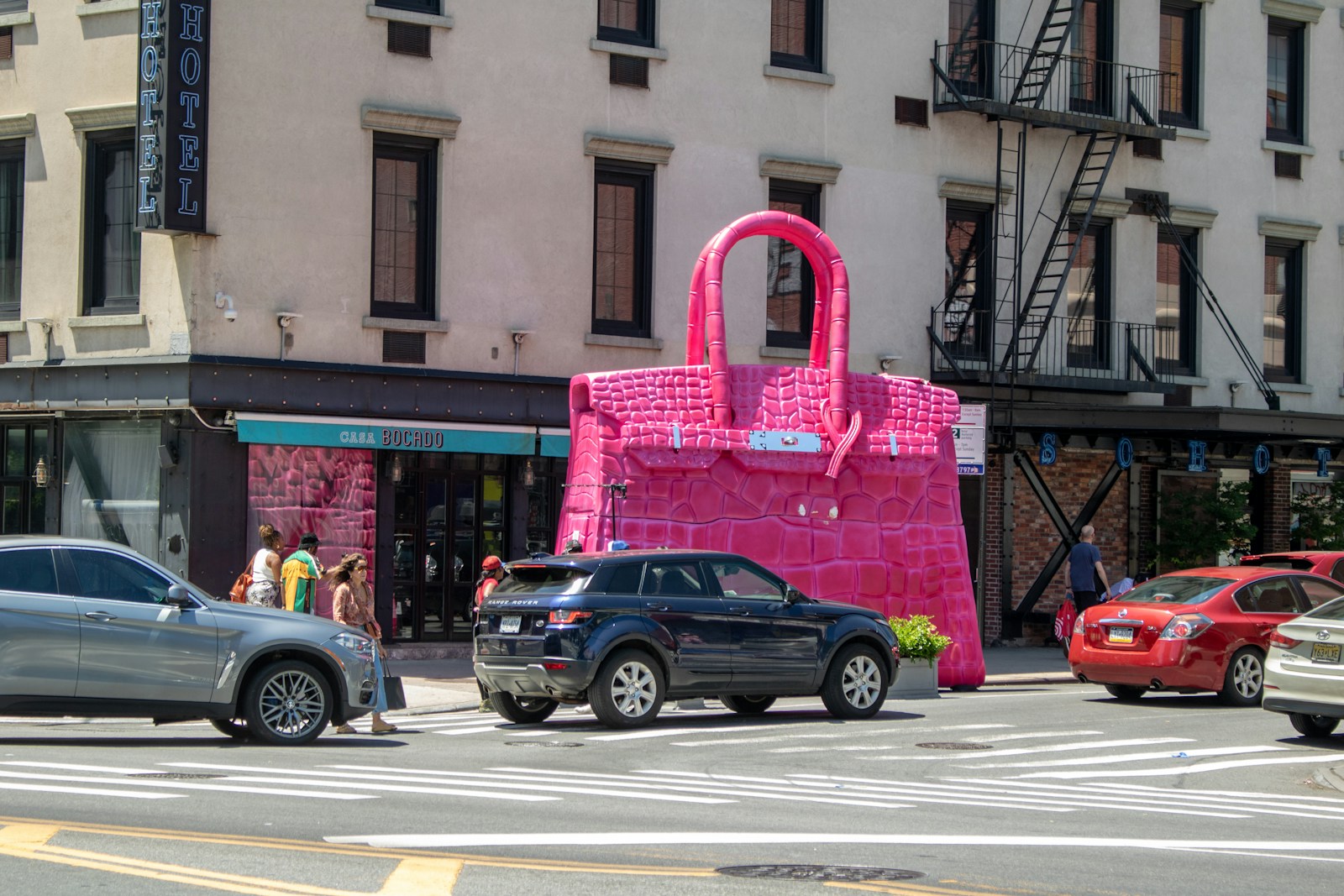 The Giant Pink Birkin Bag by Hermes. It is sculpted by WEGO and GeoEvents, and can be found in front of the SoHotel at 341 Broom street in New York City.